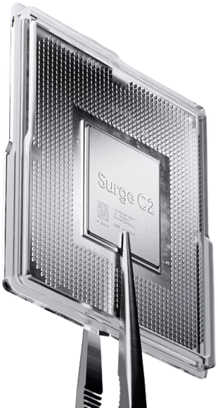 A liquid cooled compute chip held in tweezers