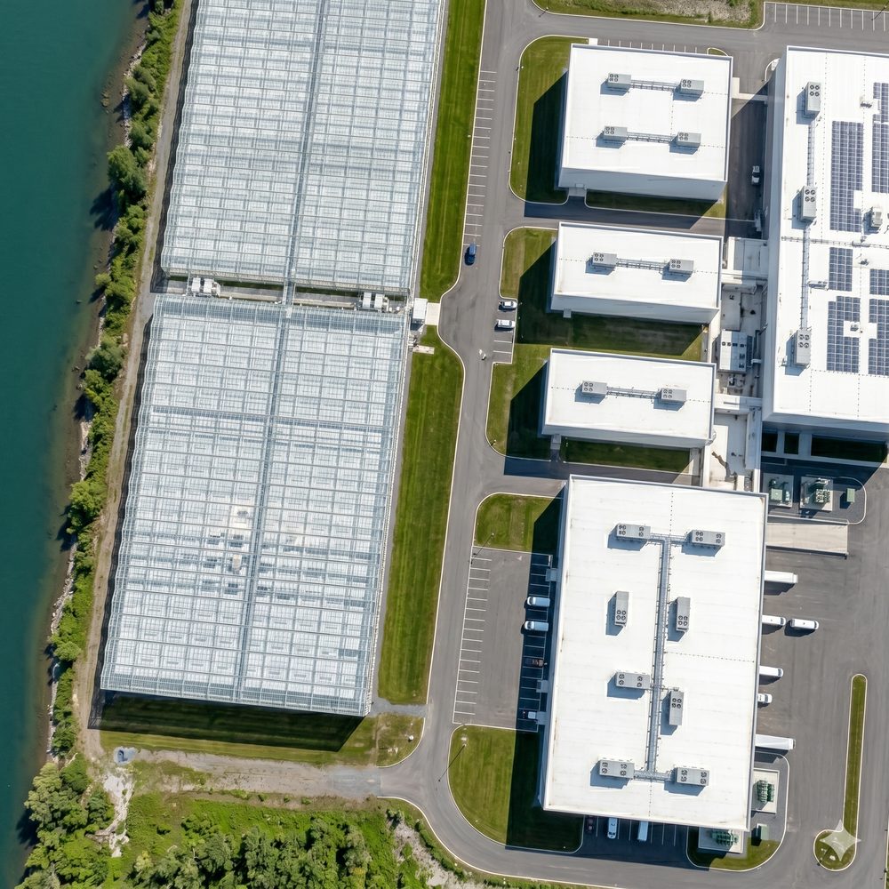 Aerial of a MicroLink campus with greenhouses